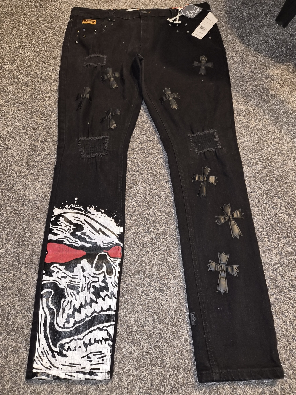 Men's Slim Straight Black Jeans with Graphic Skull and Cross Accents